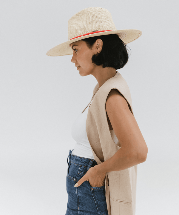 Gigi Pip Limited Edition hats for women - Limited Edition Hat 27 - wide A-line brim straw with an attached tonal straw band, featuring a red clay beaded band + a cream clay beaded band [cream]