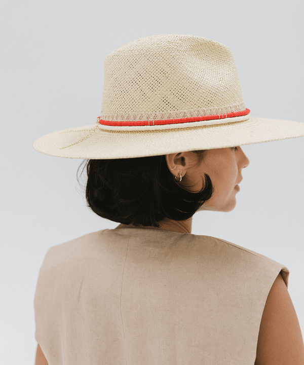 Gigi Pip Limited Edition hats for women - Limited Edition Hat 27 - wide A-line brim straw with an attached tonal straw band, featuring a red clay beaded band + a cream clay beaded band [cream]