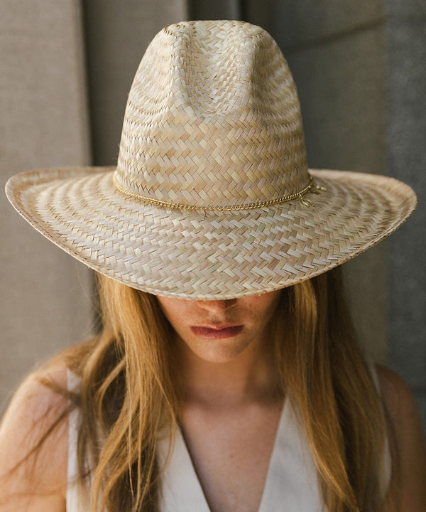 Gigi Pip limited edition hats for women - Limited Edition Hat 29 -  lightweight Mexican palmilla straw Western hat with a classic Gus crown + wide curve rolled brim at the base, featuring a gold plated metal Gigi Pip pin on the back of the crown + a gold chain trim strung with 3 western style charms [natural]
