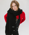 Gigi Pip winter accessories for women - Mik Oversized Scarf - 100% acrylic oversized blanket scarf featuring a retro limited edition holiday logo [black]