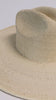 A natural colored western wide brim straw hat with a structured crown on a plain background #color_natural