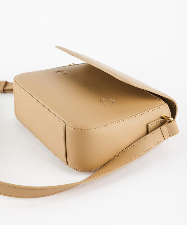 Gigi Pip luxury everyday bags for women - Rhys Crossbody Bag - 100% genuine leather everyday crossbody bag featuring gigi pip embossed + gold plated metal hardware [tan]