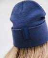 Gigi Pip beanies for women - Shay Beanie - 100% acrylic classic beanie featuring a stylized Gigi Pip loop tag on the fold that says “For the Woman Who Wears Many Hats” [navy]