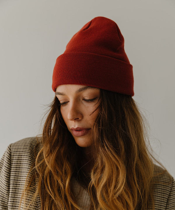 Gigi Pip beanies for women - Shay Beanie - 100% acrylic classic beanie featuring a stylized Gigi Pip loop tag on the fold that says “For the Woman Who Wears Many Hats” [brick red]