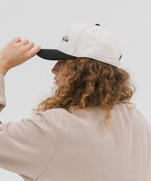 Gigi Pip trucker hats for women - Slow Morning Club Canvas Trucker Hat - 100% cotton canvas w/ cotton sweatband + reinforced from inner panel with 100% plolyester mesh trucker with Slow Morning Club embroidered on the front panel featuring an adjustable back strap [cream-black]