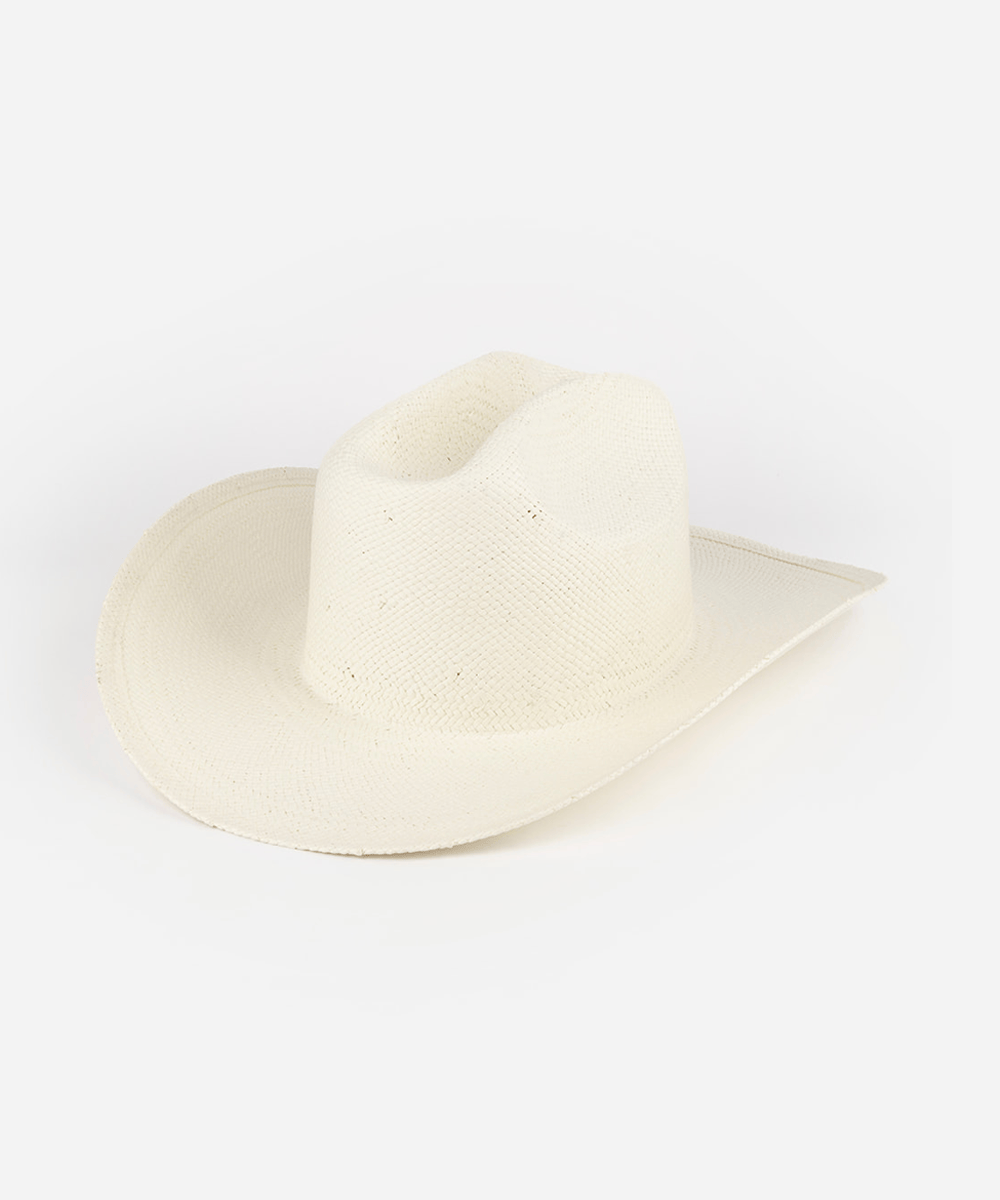 White colored straw cowboy hat on a white background #color_natural white