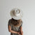 Gigi Pip straw hats for women - Bre Straw Pork Pie - straw hat with a telescope crown and a wide flat brim, featuring a knotted rope band [ivory]