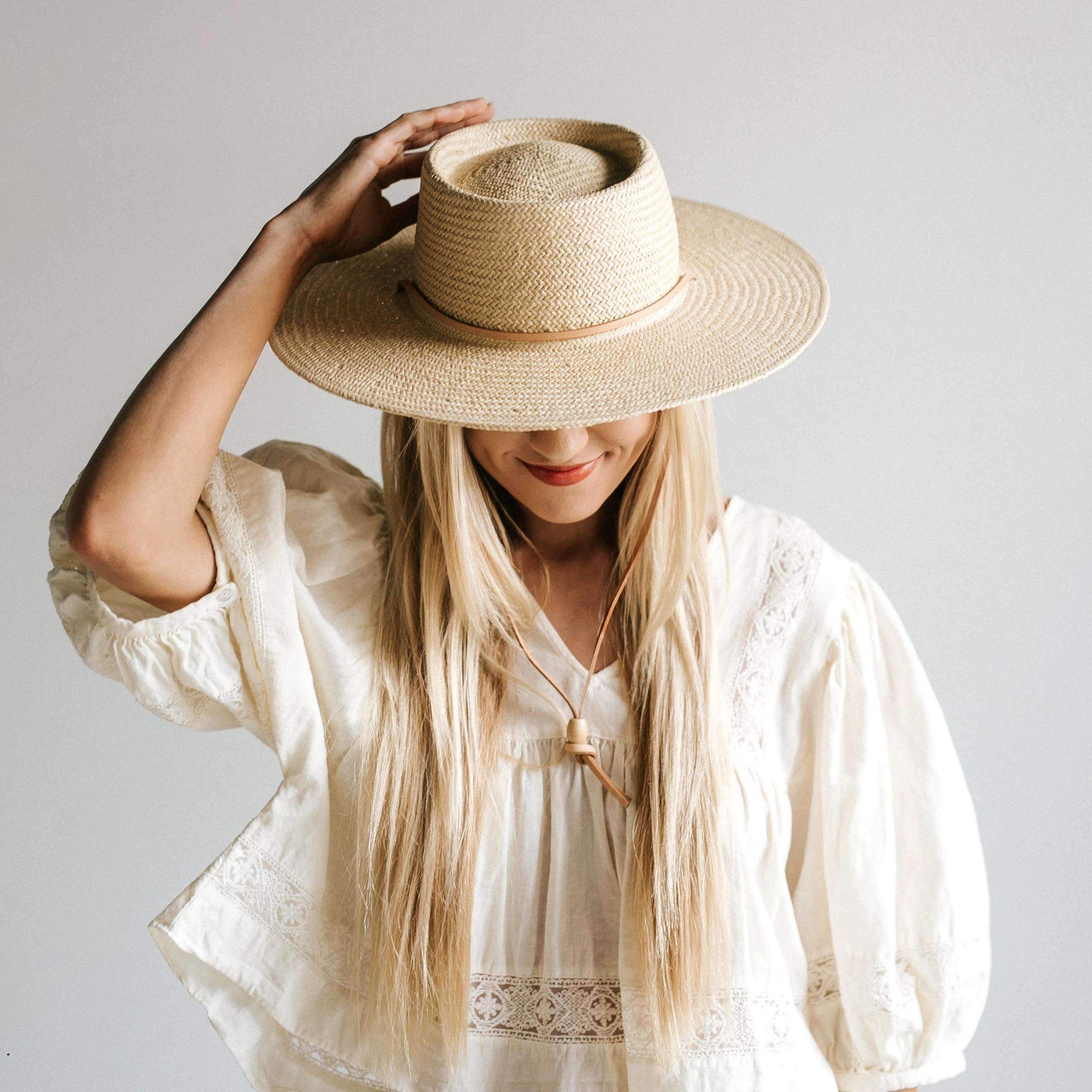 Gigi Pip straw hats for women - Aiden Straw Pork Pie - telescope crown wide brim boater featuring a tonal wooden bead on a genuine leather chinstrap [natural]