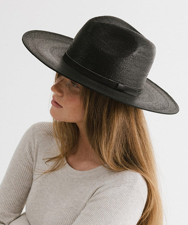 Gigi Pip limited edition hats for women - Blake wide brim fedora - 100% guatemalan palm flat brim straw fedora hat featuring a thin tonal leather band and gp pin on the back in a limited edition black color way [black]