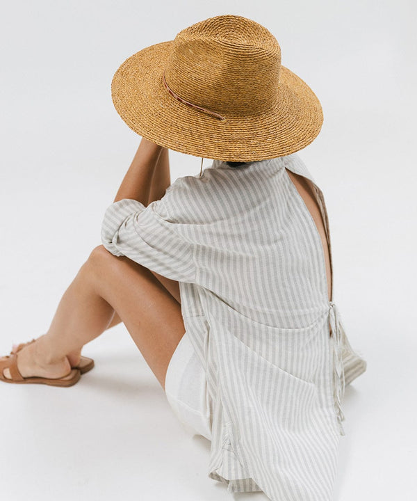 Gigi Pip straw hats for women - Ozzy Lifegaurd Hat - made of a tight weave raffia straw with a relaxed a-line brim, hand-painted leather chinstrap [honey]