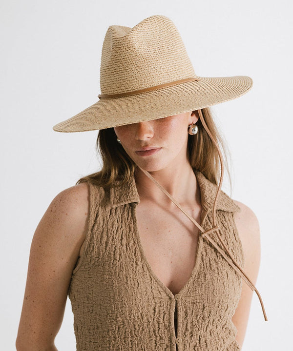 Gigi Pip straw hats for women - Ozzy Lifegaurd Hat - made of a tight weave raffia straw with a relaxed a-line brim, hand-painted leather chinstrap [natural]