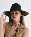 Gigi Pip straw hats for women - Ozzy Lifegaurd Hat - made of a tight weave raffia straw with a relaxed a-line brim, hand-painted leather chinstrap [black]