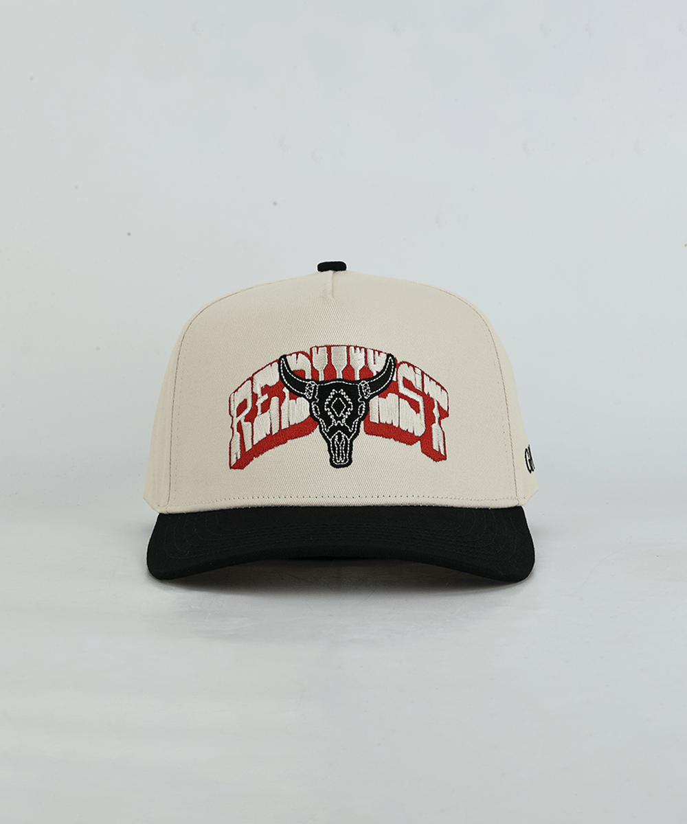 Beige, black, and red cap with bull logo on a white background #color_cream - black
