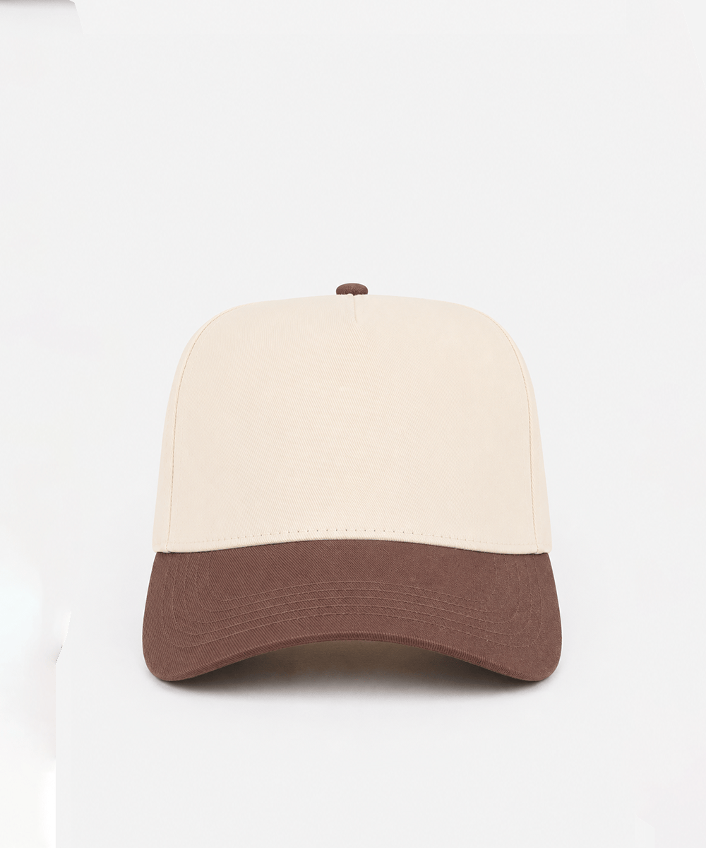 Two-tone beige and brown cap on a white background #color_cream - brown
