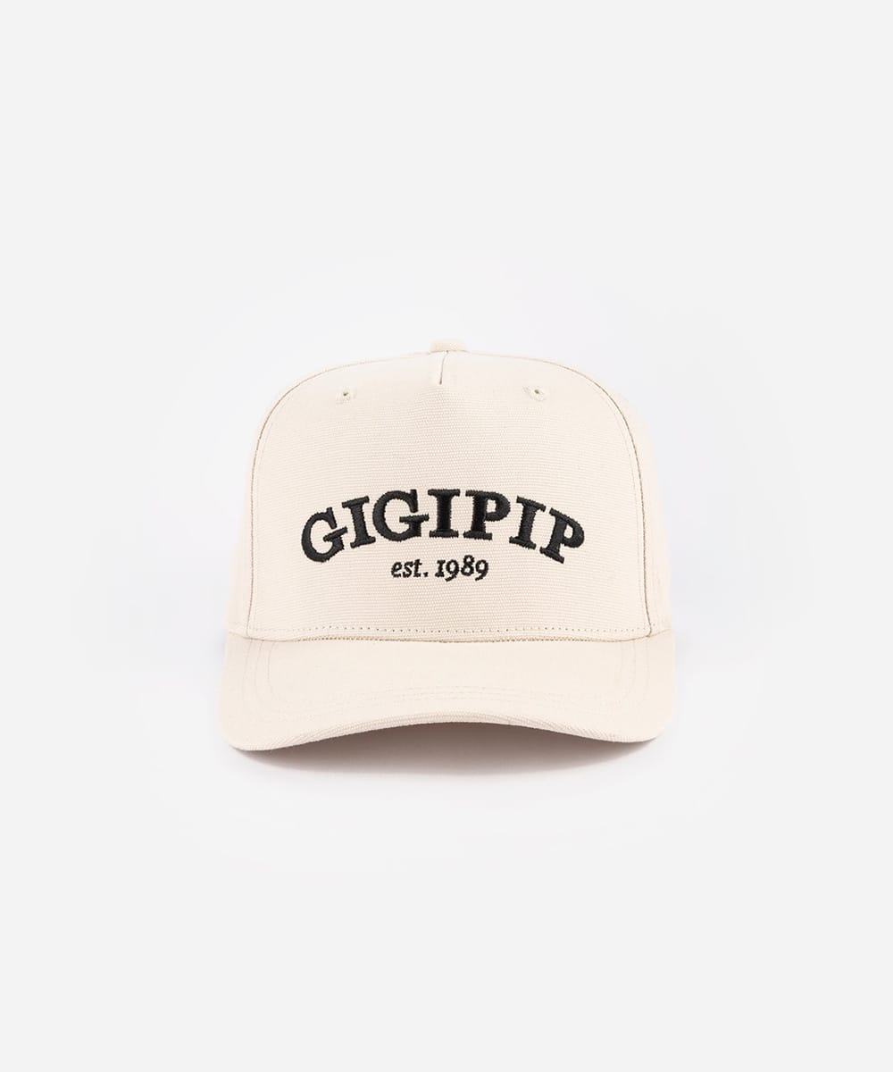 Beige cap with 'GIGIPIP est. 1989' text on a white background #color_cream