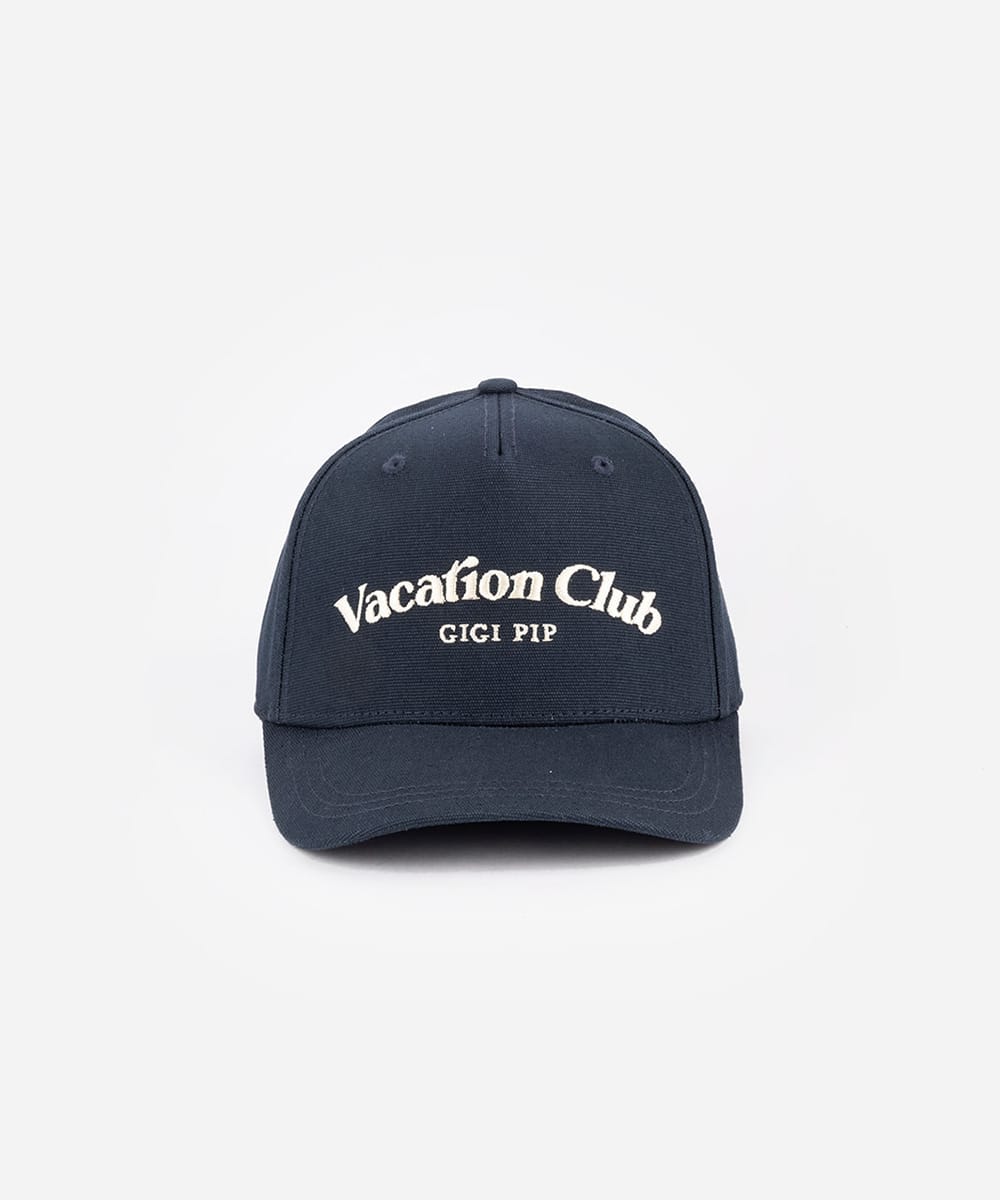 Navy blue cap with 'Vacation Club' text on a white background #color_navy
