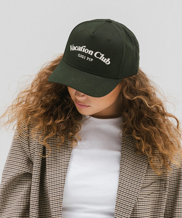 Gigi Pip trucker hats for women - Vacation Club Canvas Trucker Hat - 100% cotton canvas w/ cotton sweatband + reinforced from inner panel with 100% plolyester mesh trucker with Vacation Club embroidered on the front panel featuring an adjustable back strap [dark green]