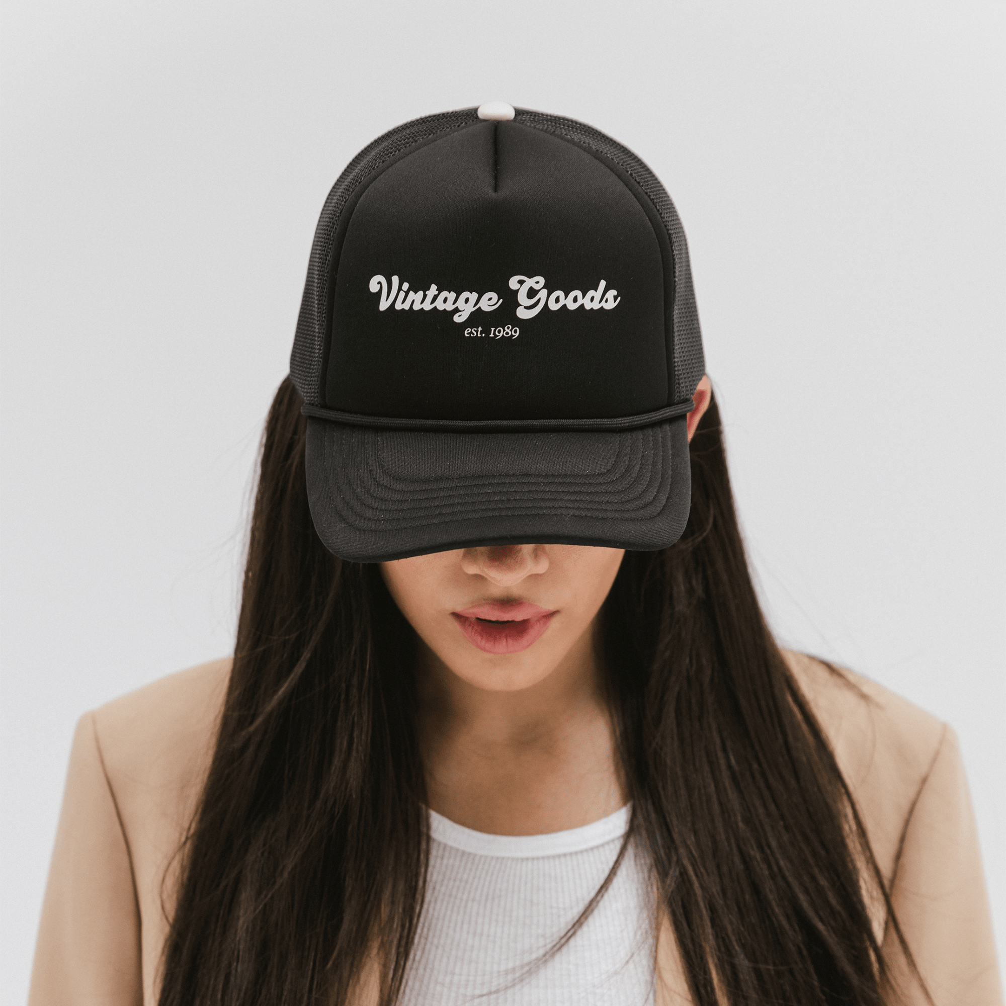 Gigi Pip trucker hats for women - Vintage Goods Foam Trucker Hat - 100% polyester foam + mesh trucker hat with a curved brim featuring the words 