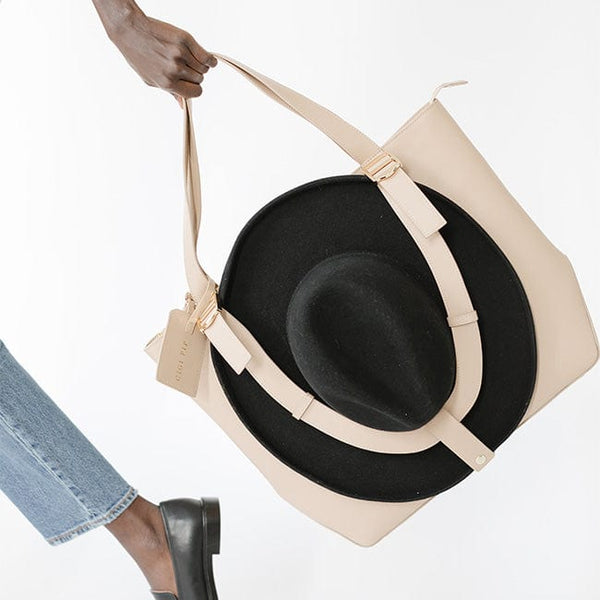 Gigi Pip hat carrying totes for women - Leather Hat Carrying Tote - 100% genuine leather hat carrying tote featuring a "U" strap to cradle your hat to your bag + two interior pockets [nude]